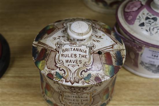 A Sunderland pink lustre jar and cover and two other jars and covers